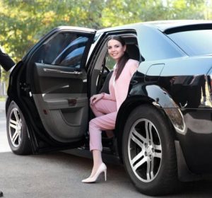 depositphotos_135912534-stock-photo-businesswoman-in-luxury-car